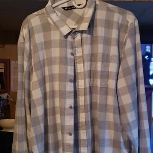 Travis Matthew's shirt